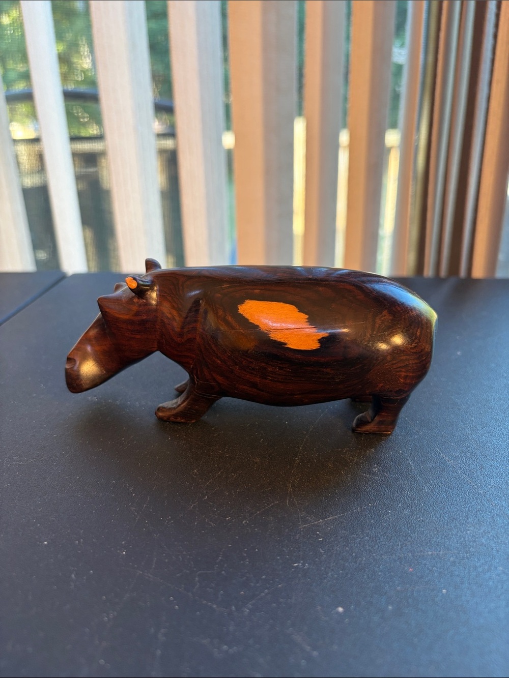 Handcrafted Dark Wood Hippo Sculpture with Orange Accent